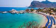 Kolymbia beach with the rocky coast in Greece.